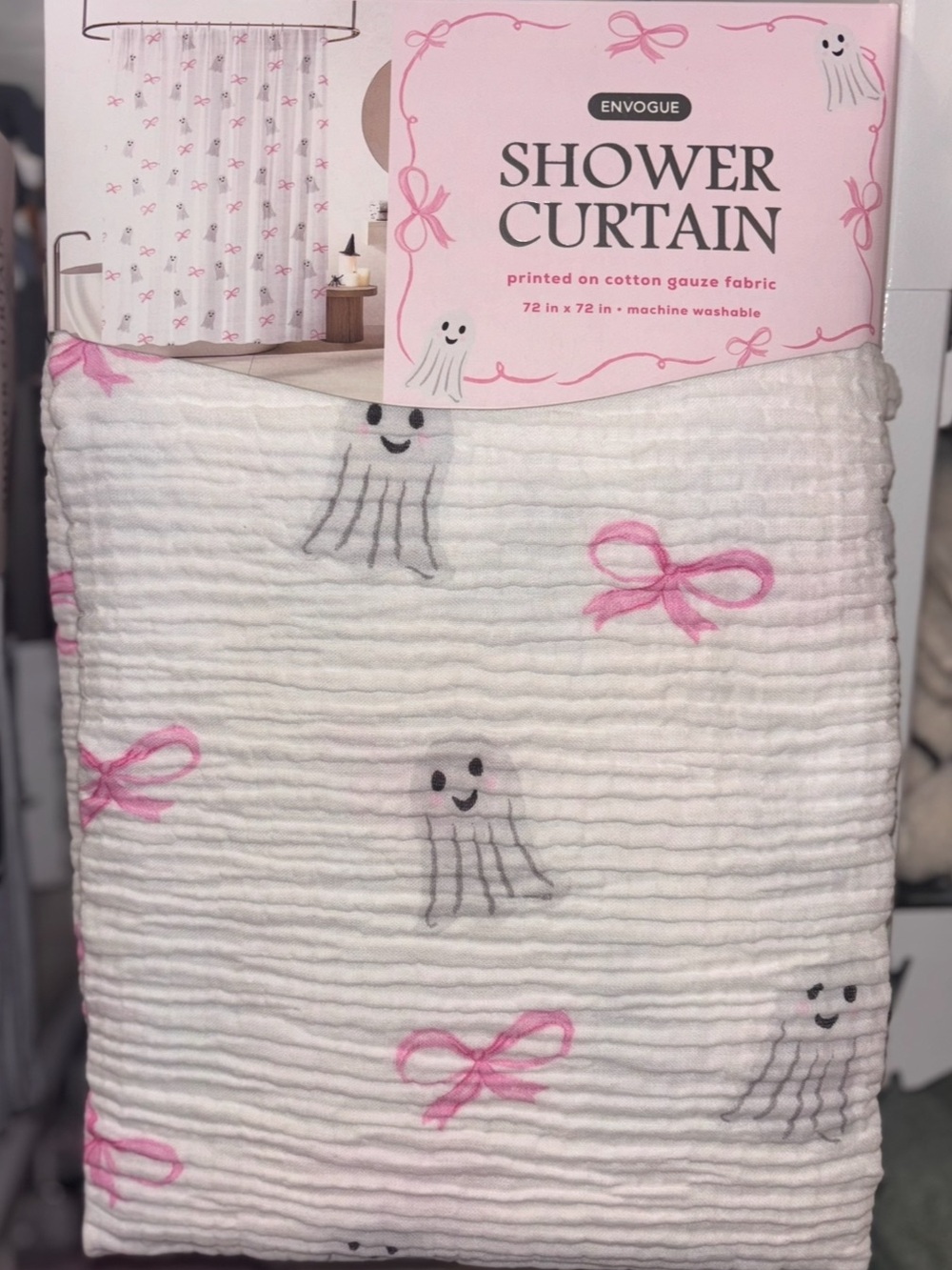 Viral Envouge shower curtain ghosts ans pink bows on white background